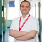 Dr. Marius Moga