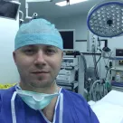 Dr. Razvan Dragomir